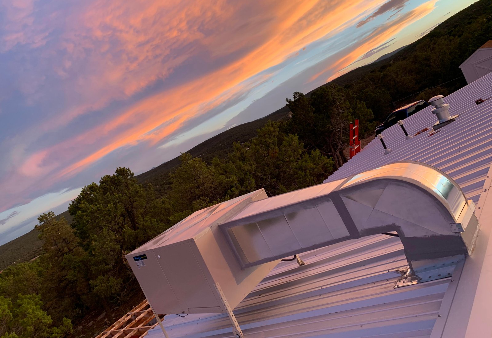 Rooftop HVAC units receiving professional commercial service in Tulsa.